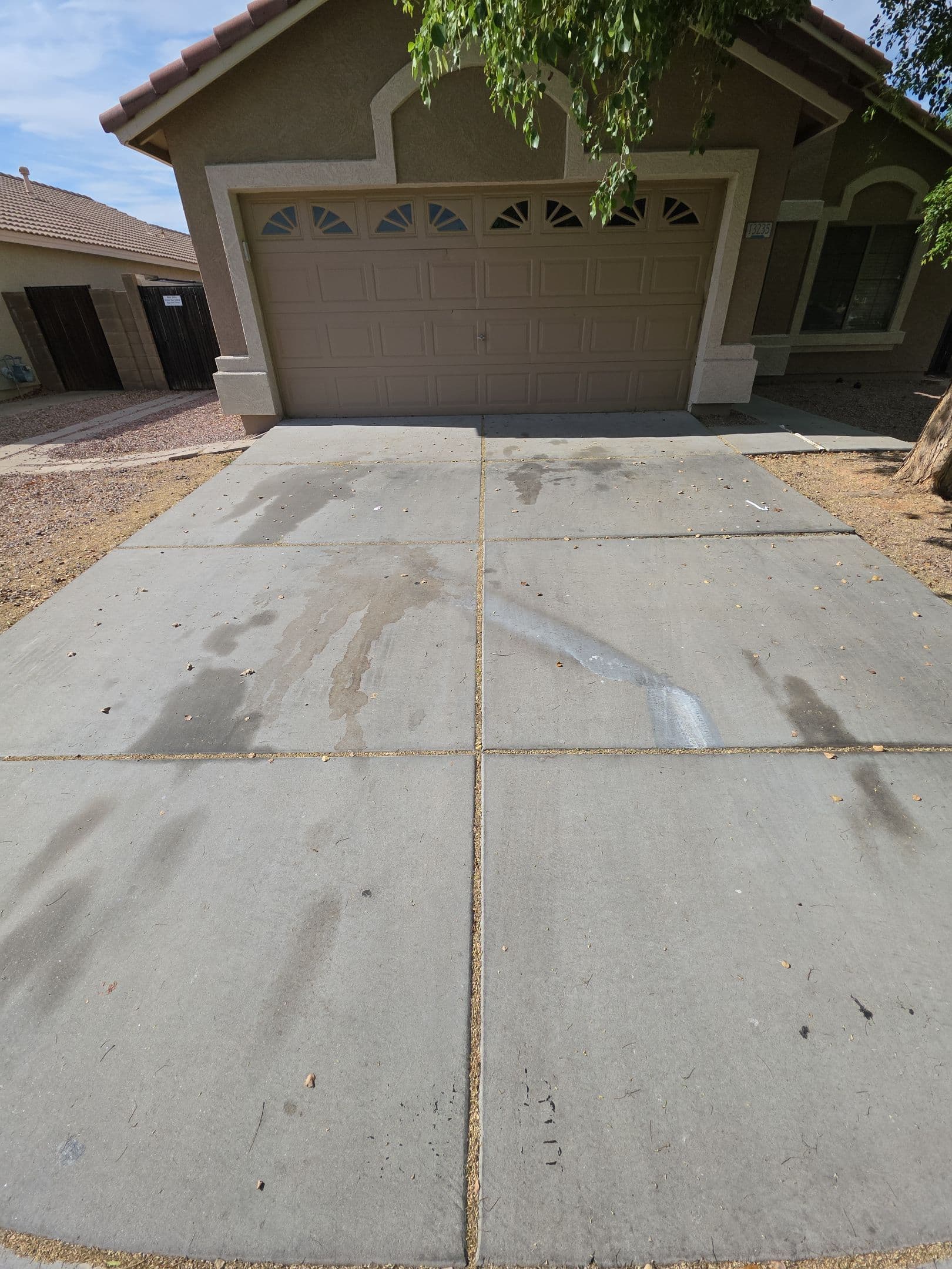 Gallery photos for Oil Stains Meet Their Match on This Concrete Driveway: Image #1