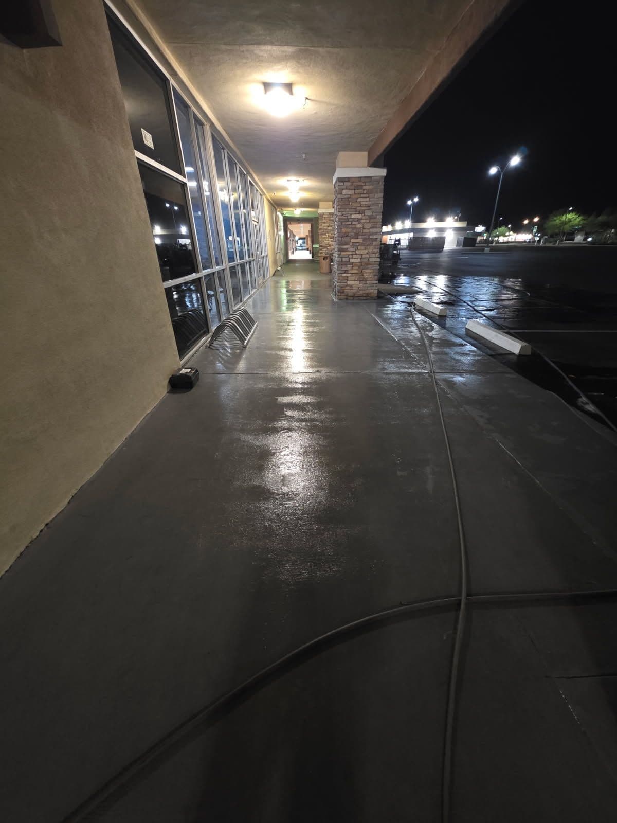 Shiny Sidewalks and Storefronts in Phoenix image