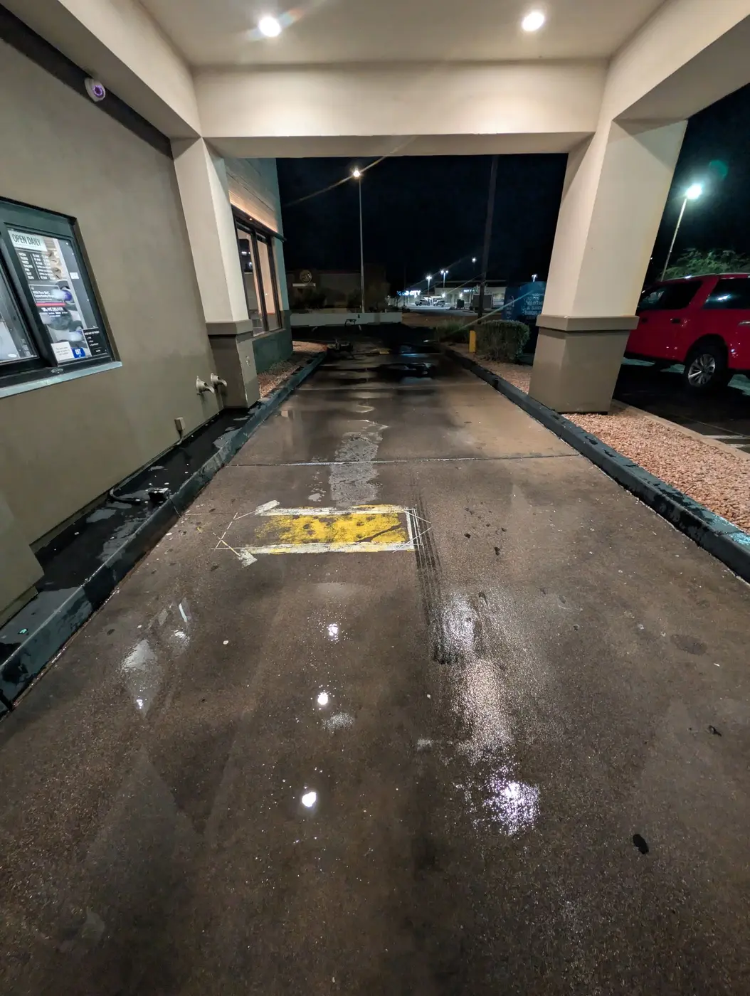 After-hours hot-water cleaning at a restaurant drive-thru