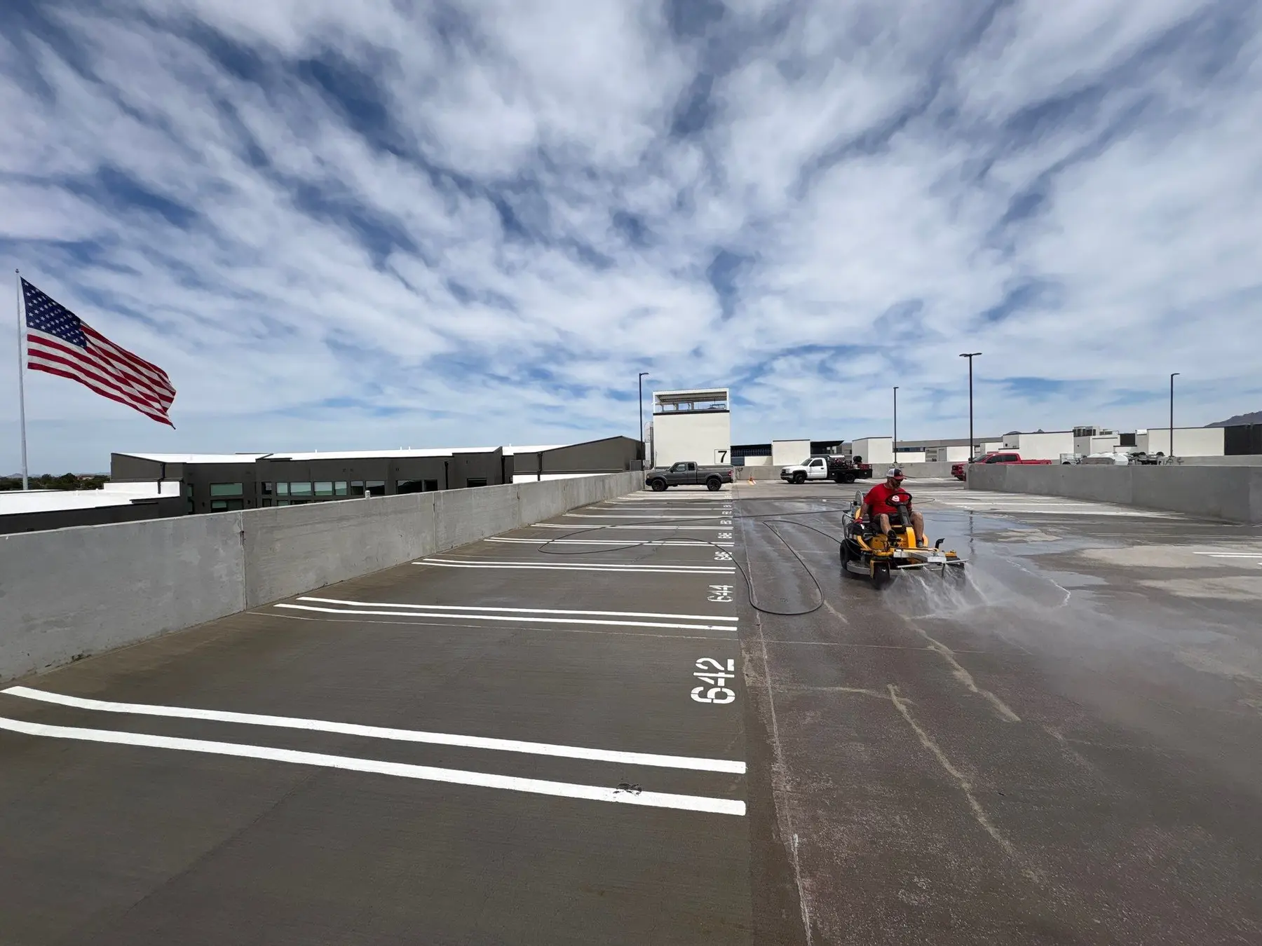 Seventh-floor parking deck being cleaned at Modera Scottsdale
