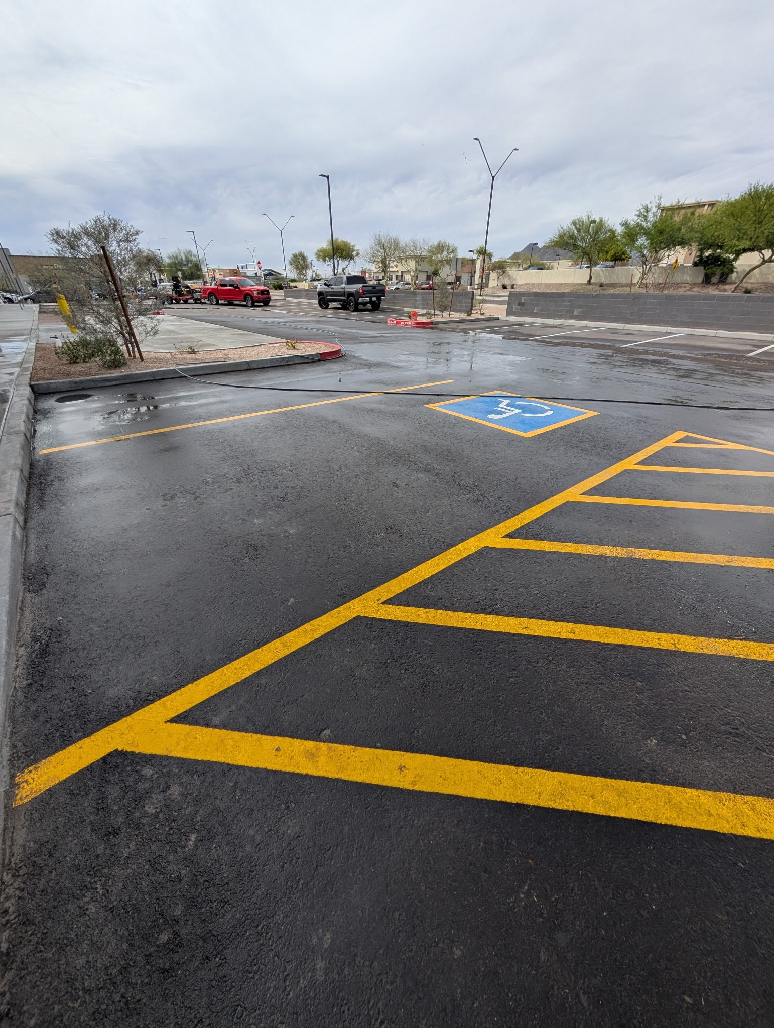 Cleaned asphalt and parking area at the PCA project